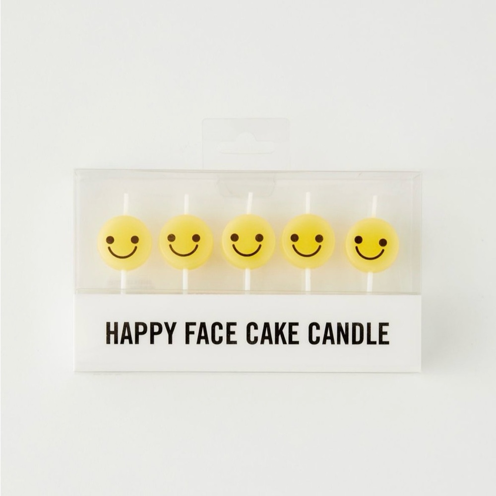 UO Happy face cake candle set